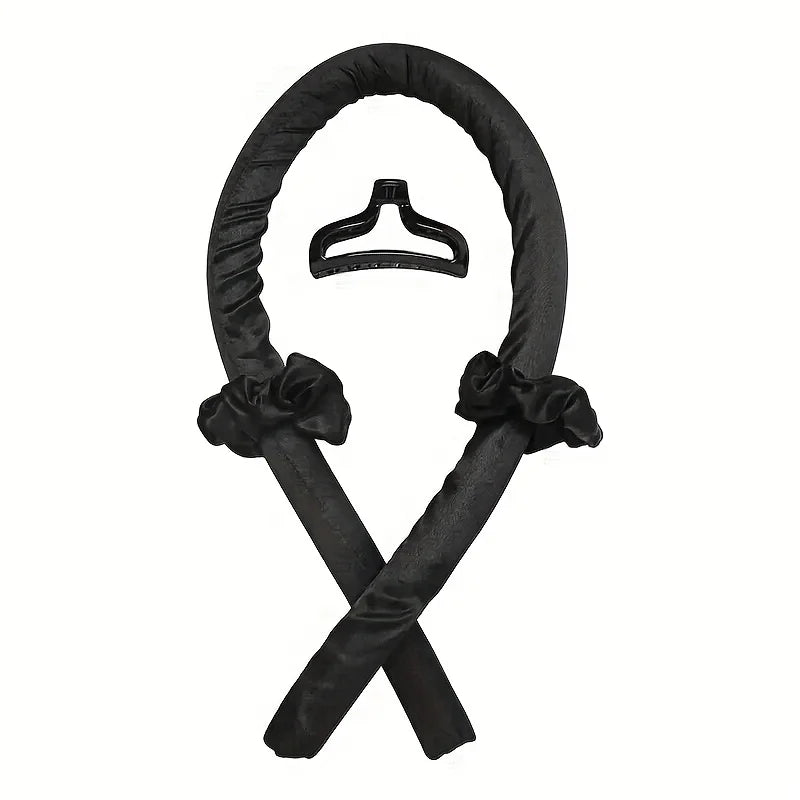 Black satin hair band with floral ends on a white background